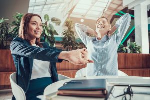 friends-stretching-in-office